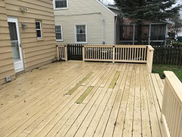 Before picture of a deck restoration project done by Chagrin Home Improvements