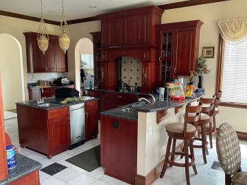 Before picture of a cabinet painting project done by Chagrin Home Improvements