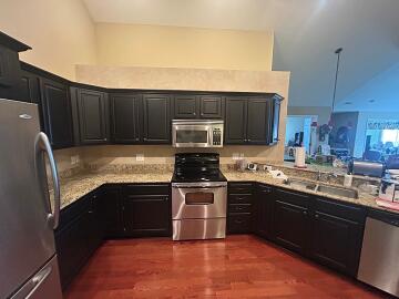 After picture of a cabinet painting project done by Chagrin Home Improvements