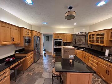 Before picture of a cabinet painting project done by Chagrin Home Improvements