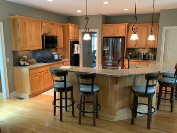 Before picture of a cabinet painting project done by Chagrin Home Improvements